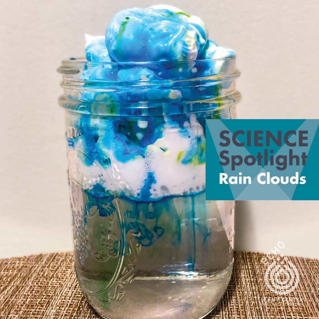 Image of shaving cream in a jar with food coloring coming down into water