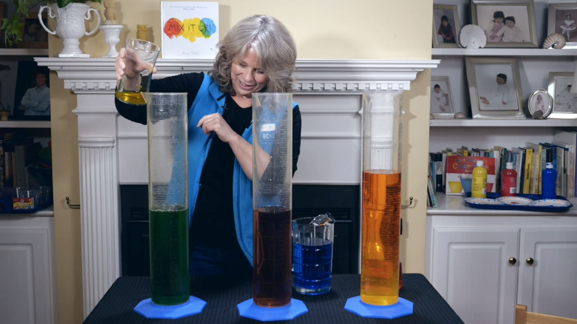 Elizabeth mixing colors after reading a book.