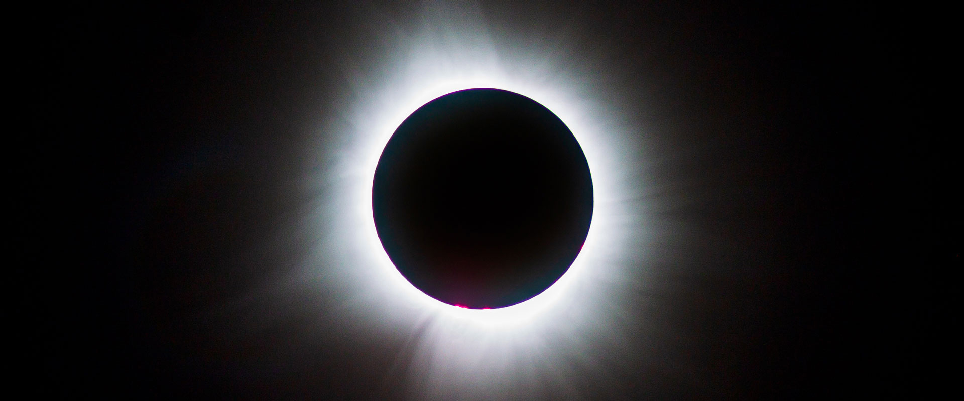 A photo of totality. The Sun's corona is visible.